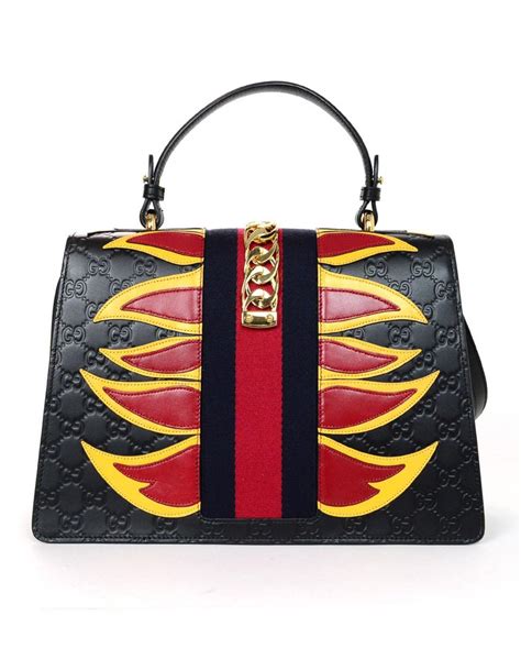 gucci flame bag replica|look alike gucci bag.